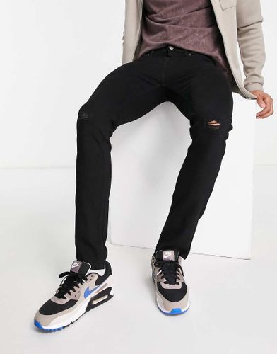 Jeans strappati neri skinny-Nero - Another Influence - Modalova