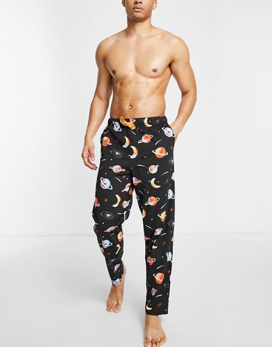 Pantaloni del pigiama con stampa universo - ASOS DESIGN - Modalova