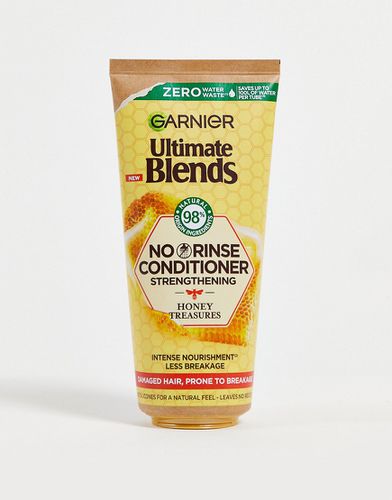 Ultimate Blends - Balsamo rinforzante senza risciacquo al miele per capelli danneggiati da 200ml - Garnier - Modalova