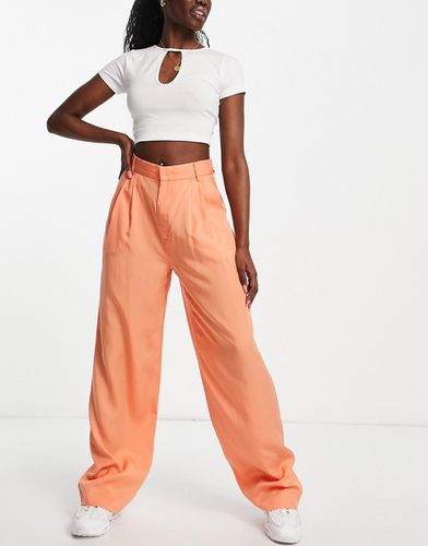 Pantaloni attillati con fondo ampio, colore papaya - Emory Park - Modalova