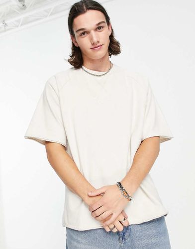 T-shirt bianca slavata con logo-Bianco - Karl Kani - Modalova