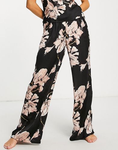 Pantaloni del pigiama in raso nero con stampa a fiori - Hunkemoller - Modalova