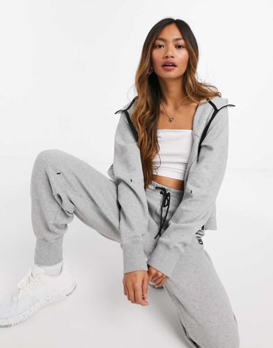 Felpa tecnica con cappuccio in pile grigio-Nero - Nike - Modalova